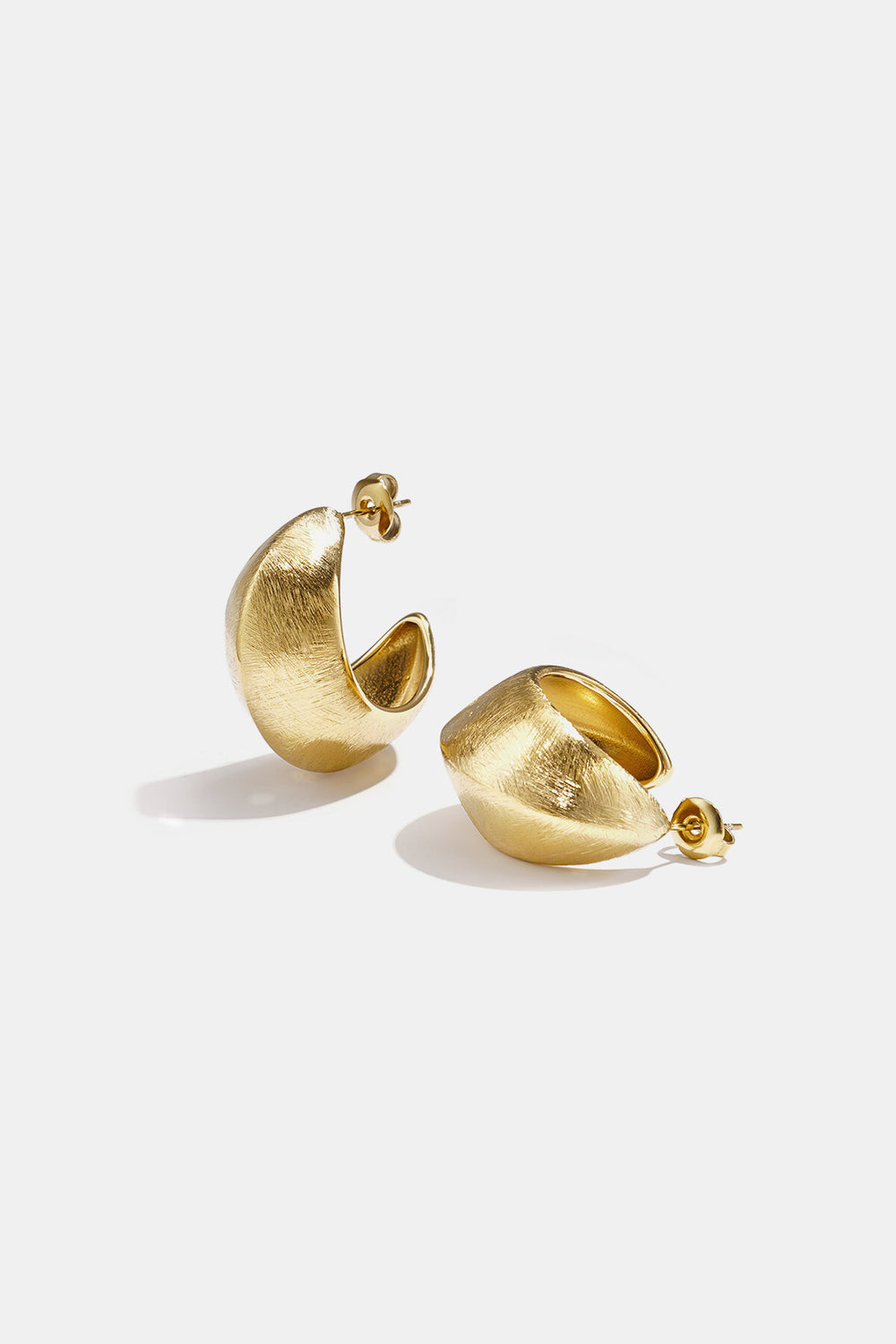 Boucles d’oreilles bombées texturées dorées Lumé en acier inoxydable