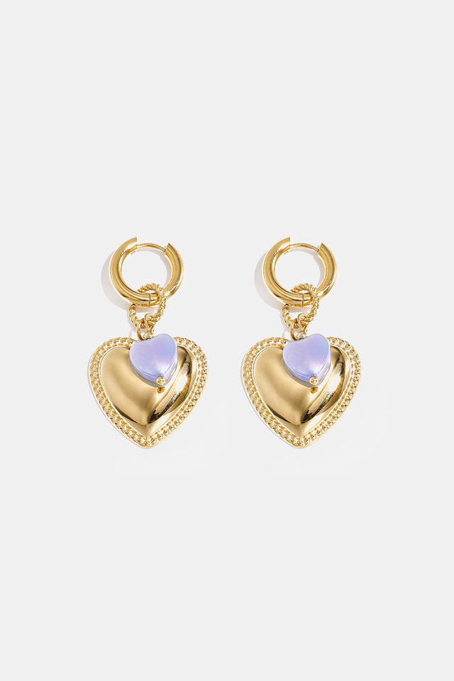 Boucles d’oreilles pendantes cœur doré et cristal lilas Lumé sur fond clair