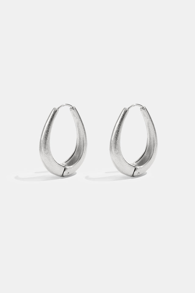 Boucles d’oreilles goutte sculptée couleur argent en acier inoxydable