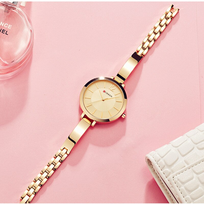 Montre femme dorée, à quartz, bracelet acier, graphique – Vente Flash Bijoux