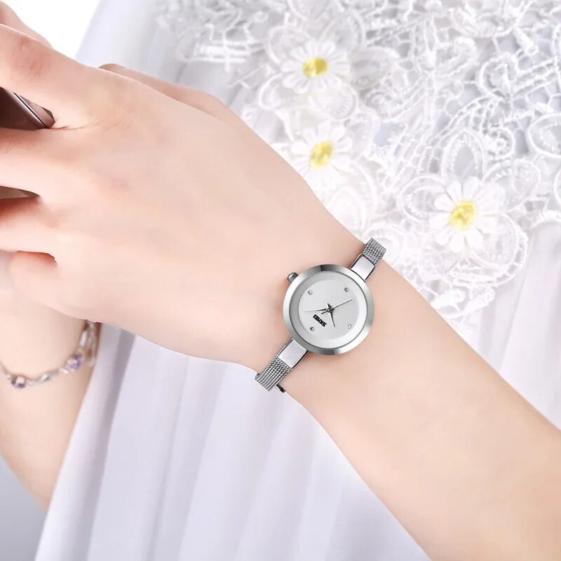 Montre femme dorée rose, à quartz, bracelet acier – Vente Flash Bijoux